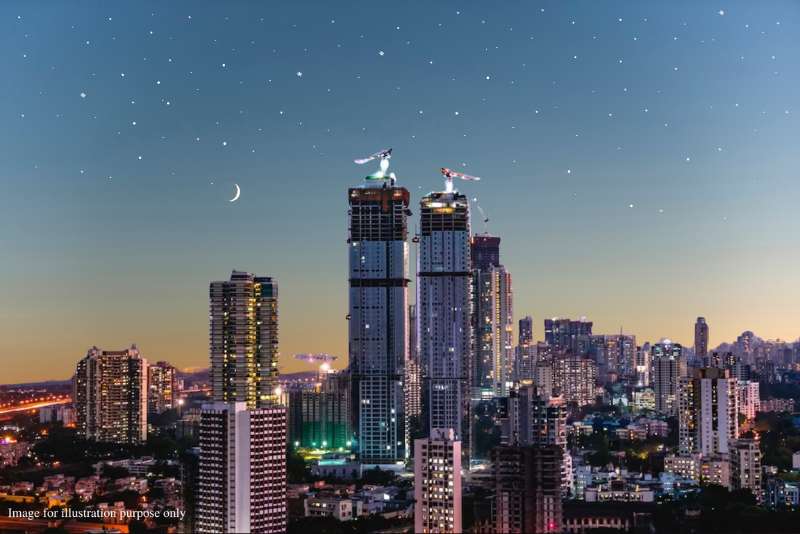 Vadodara city skyline featuring modern flats and infrastructure.